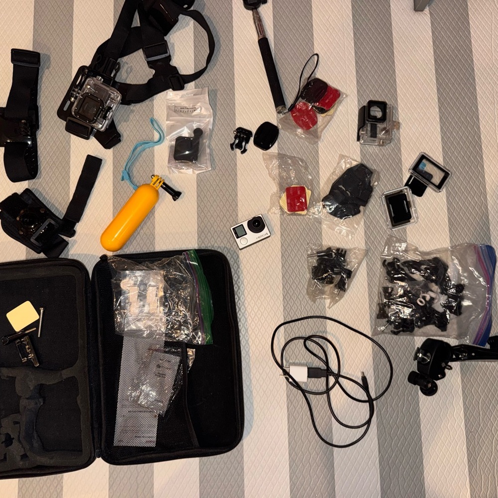 Hero4 GoPro with lots of accessories. Used once